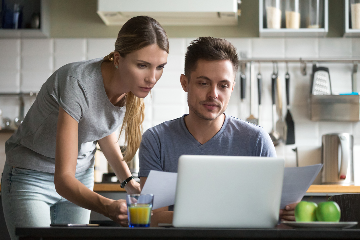 Couple looking at computer