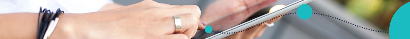 Close up image of woman using tablet