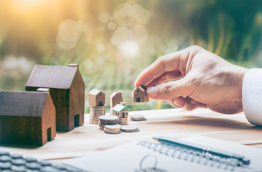 Balancing coins and houses