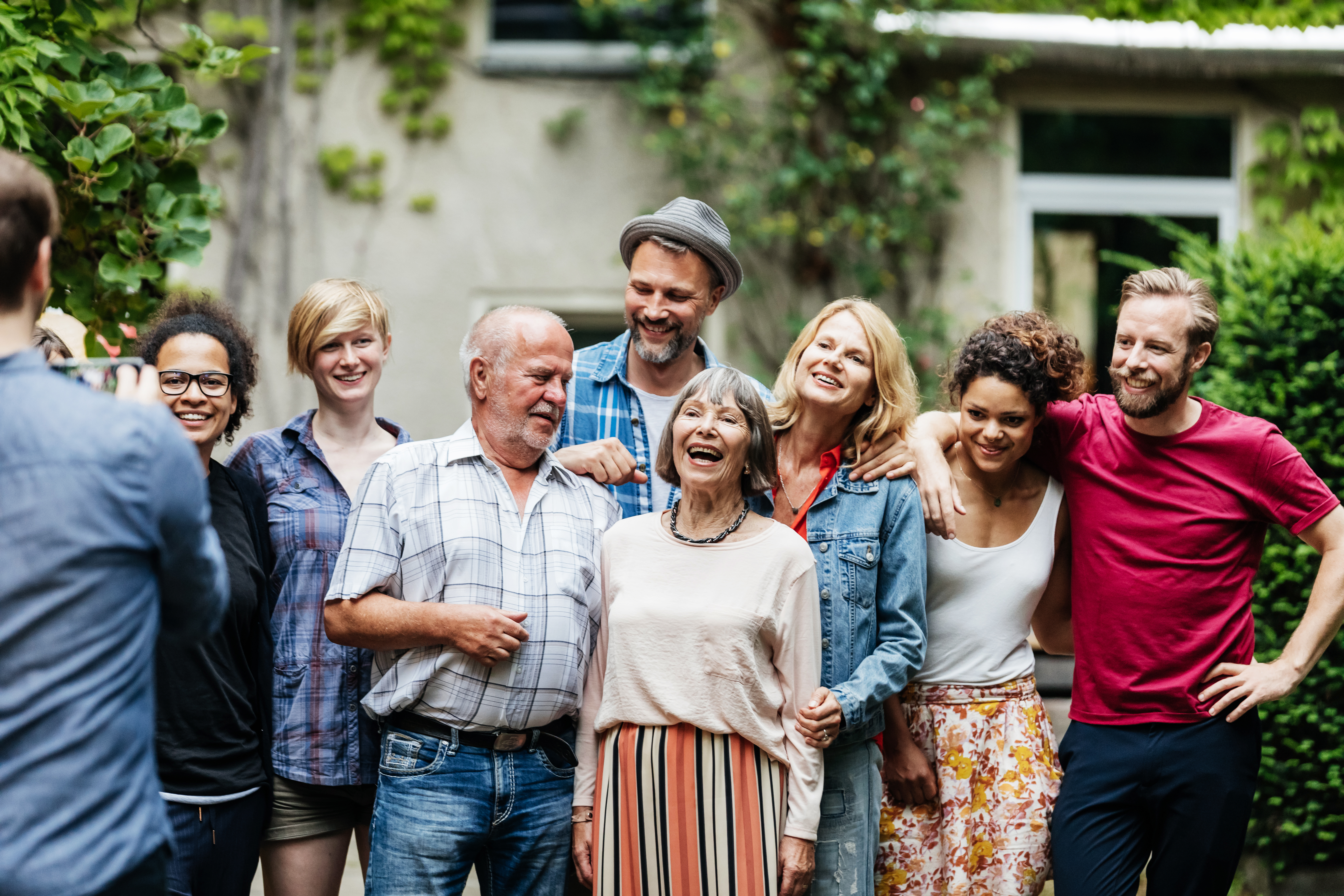 Group of people smiling outside