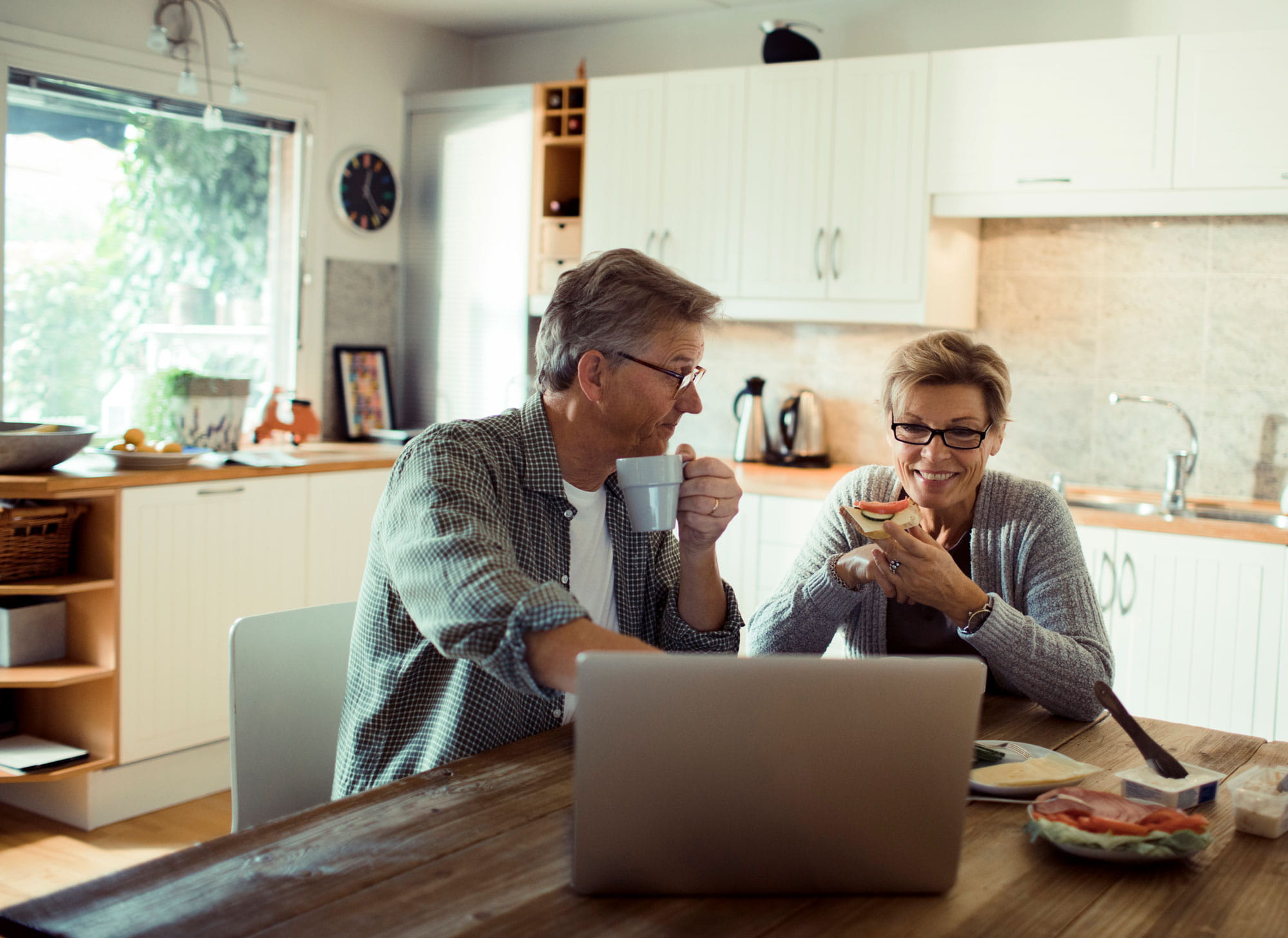 Couple using laptop