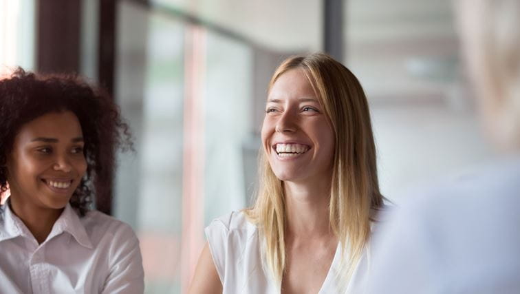 Smiling women at work